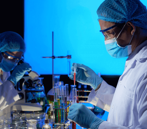 Two Pharmaceutical Scientists Do Testing In Lab